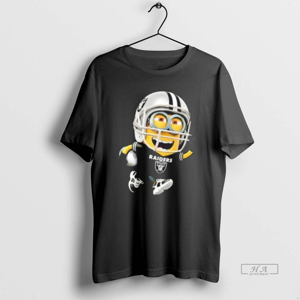 Trendy Minions Is Holding A Ball And Smiling At Oakland Raiders Fans
