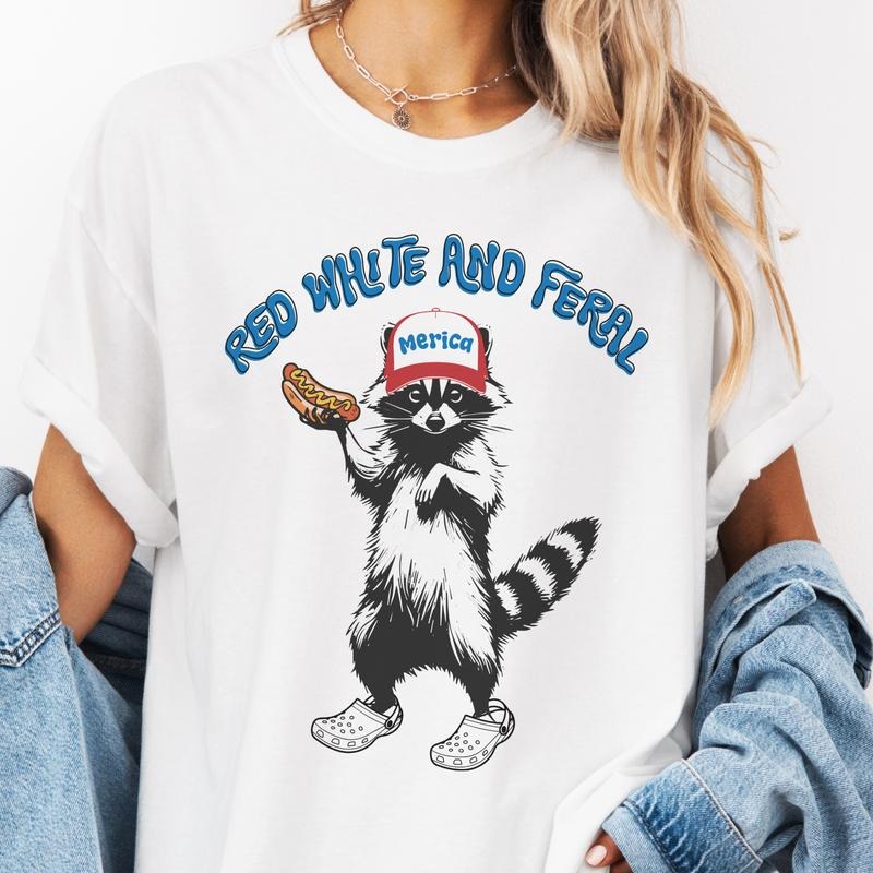USA Red White and Feral Racoon Graphic Tee Patriotic Racoon Tshirt Trucker Hat Hot Dog Eating Redneck Shirt Unisex Casual...