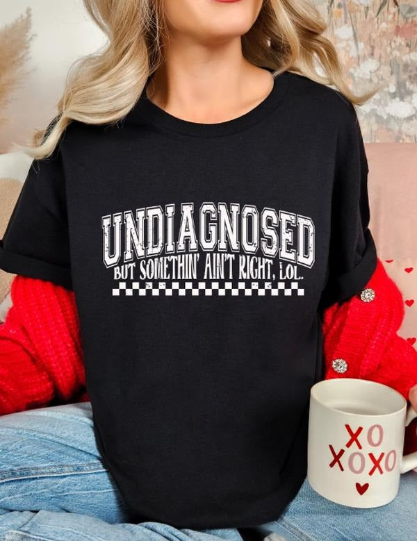 Undiagnosed but something ain't right funny casual softstyle unisex t-shirt Hoodie, Sweatshirt | DripVista.com