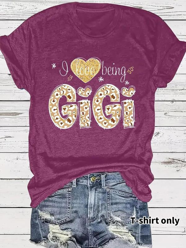 Women'WB shield "Swoosh Love Being Gigi" Letter Print Round Neck Graphic Tee, Vintage Trendy Casual Short Sleeve T-shirt...