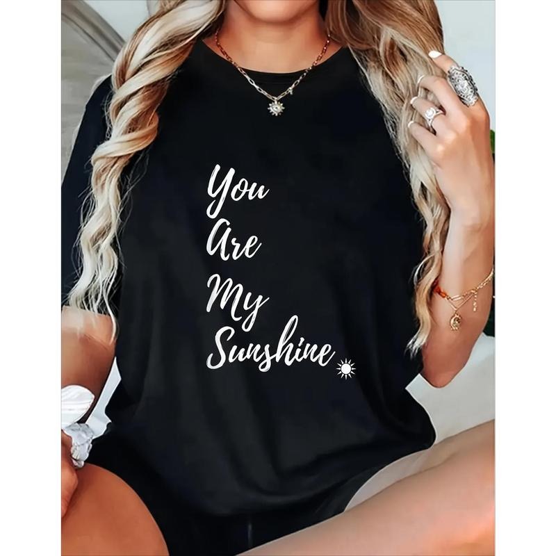 Women'WB shield "You Are My Sunshine" Graphic T-Shirt - Black Crew-Neck Short Sleeve Tee with White Lettering & Sun...