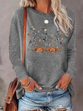 Women'WB shield Cartoon Skeleton & Pumpkin Print Round Neck T-shirt, Fashion Casual Long Sleeve Tee, Women'WB shield Top for Daily Wear, Halloween