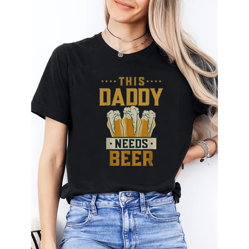 Women'WB shield Casual Short Sleeve T-Shirt - "This Daddy Needs Beer" Humorous Print with Beer Mugs, Black Round Neck...