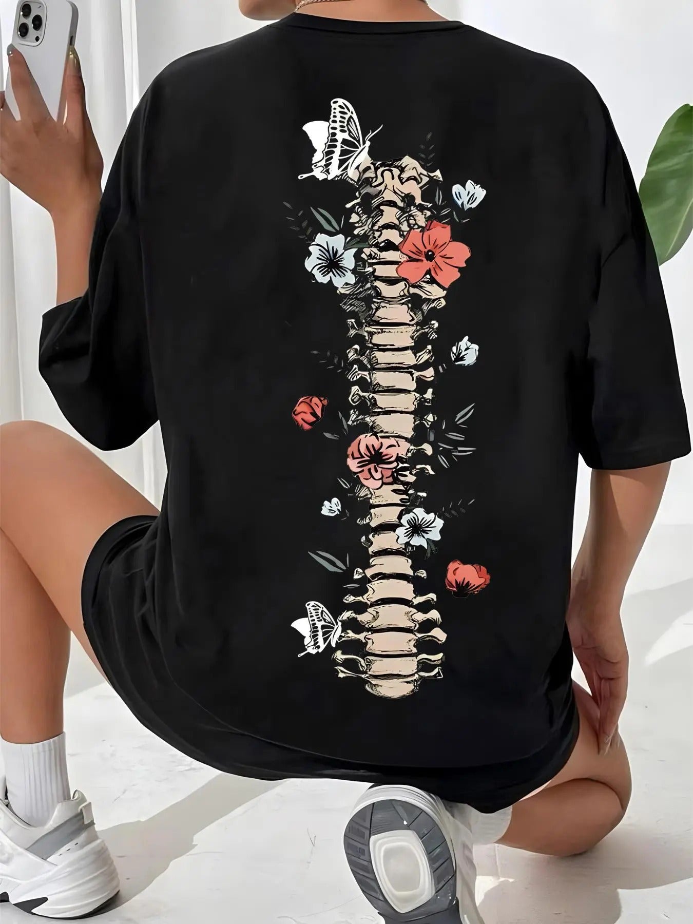 Women'WB shield Graphic Drop Shoulder Tee, Fashion Skeleton & Floral Print Half Sleeve T-shirt, Chic Summer Tee Shirts,...