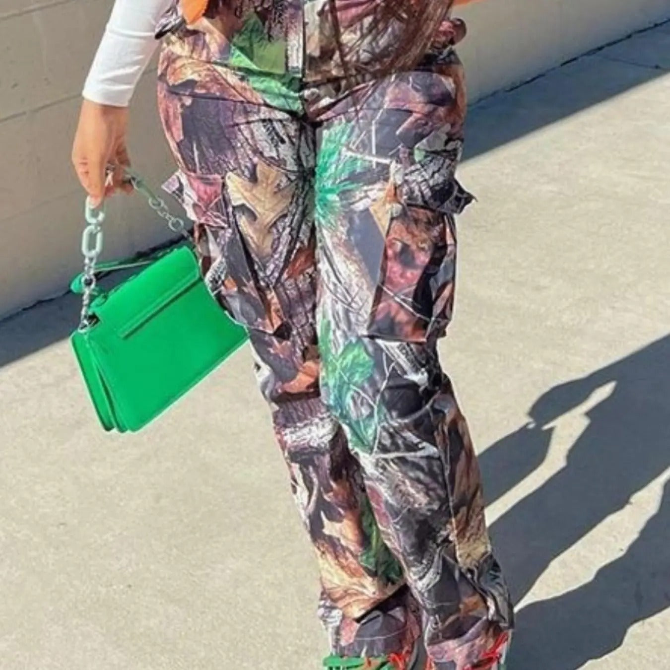 Women'WB shield Spiky hair fighters Over Print Pocket Cargo Pants, Casual Button Fly Trousers for Daily Wear, Ladies...