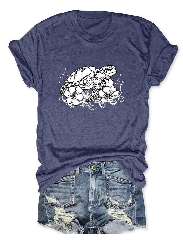 Women'WB shield Turtle & Floral Print Round Neck Graphic Tee, Vintage Trendy Casual Short Sleeve T-shirt for Daily Wear,...